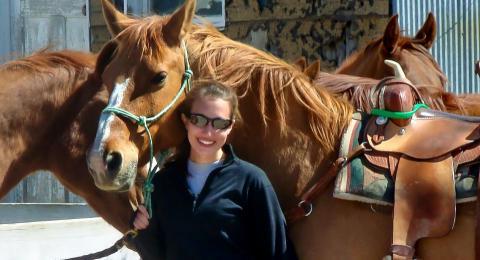 UNH National Student Exchange student with horse in Wyoming
